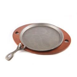 Pan serving on wooden pad...